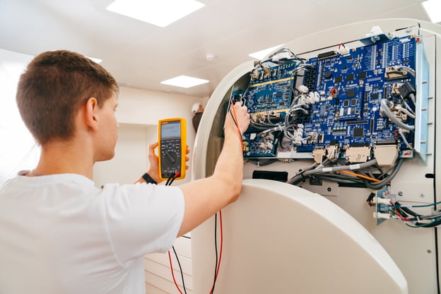 Medical device technician working
