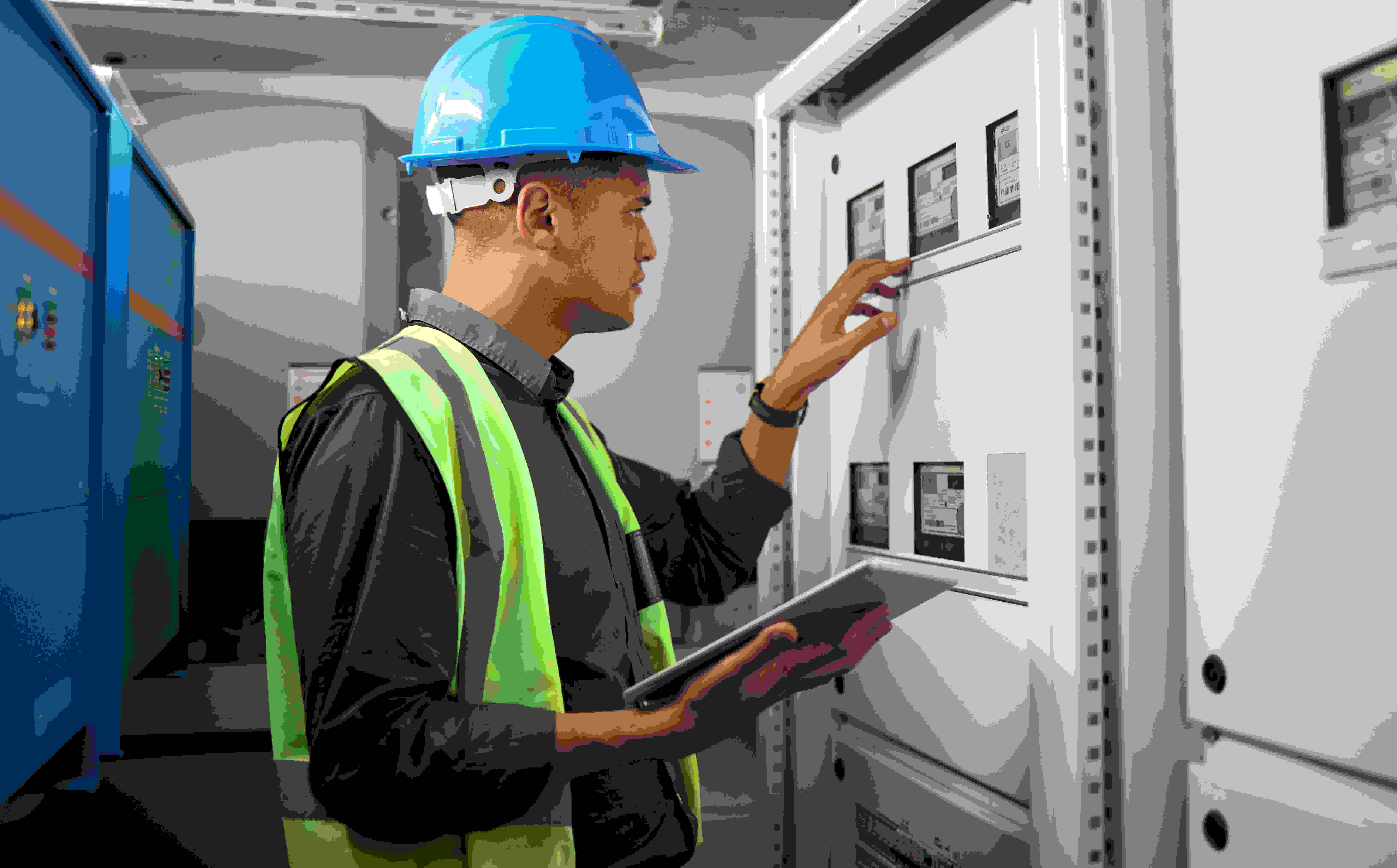 Field Technician Working with Tablet